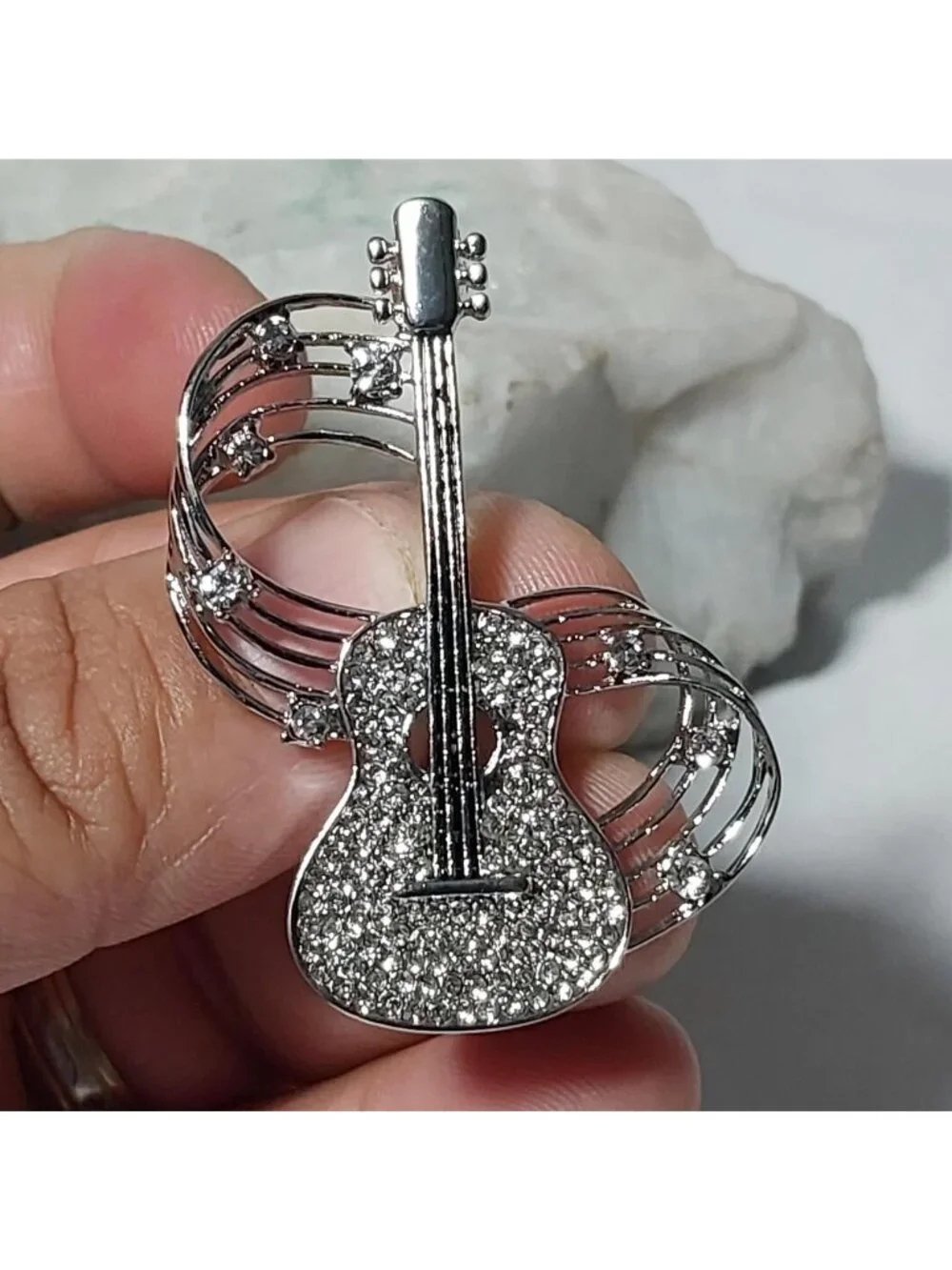 Silver Tone Guitar With Music